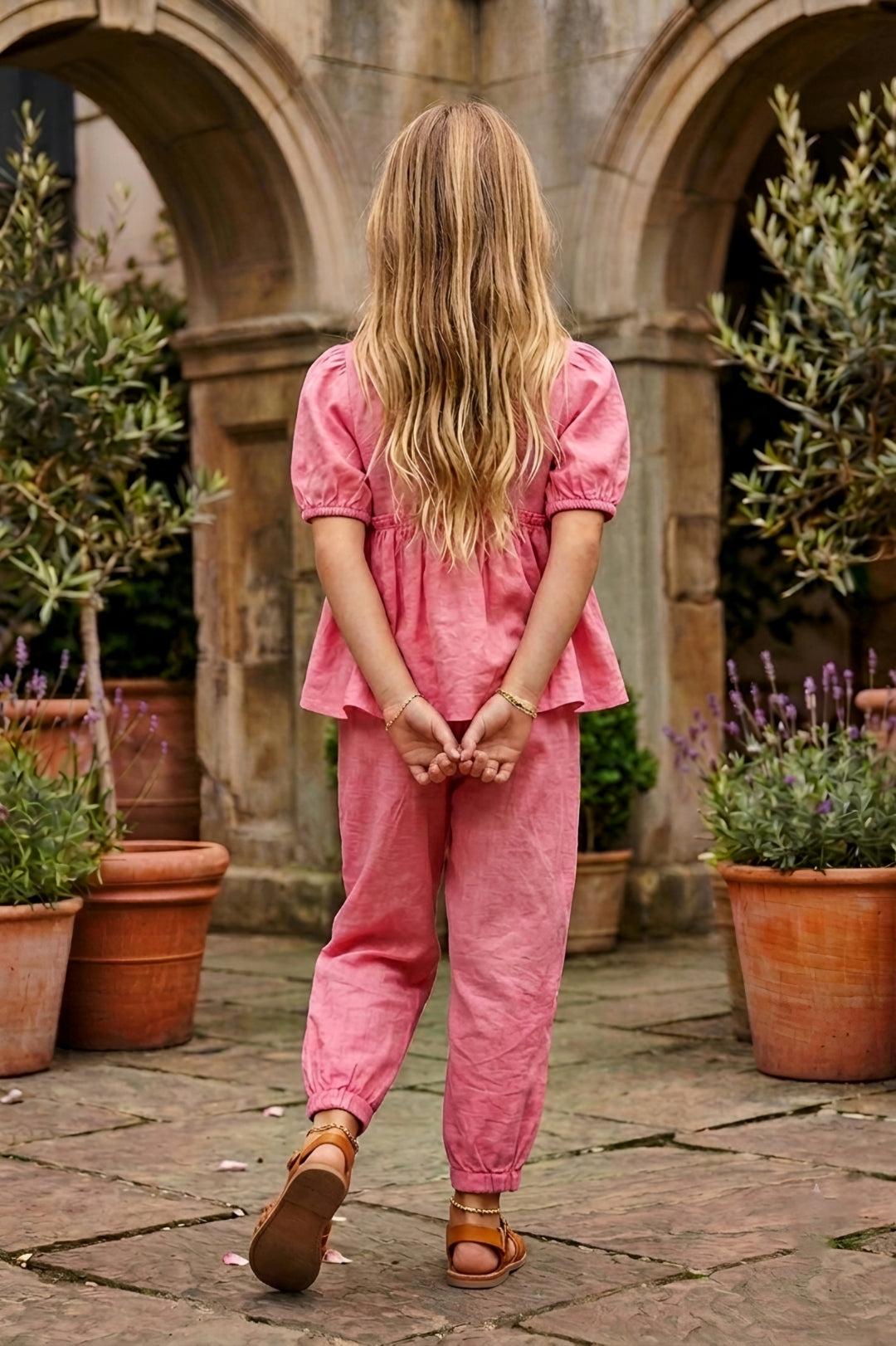 Girls Pink 2-Piece Peplum Set with Embroidered Design & Capri Pants