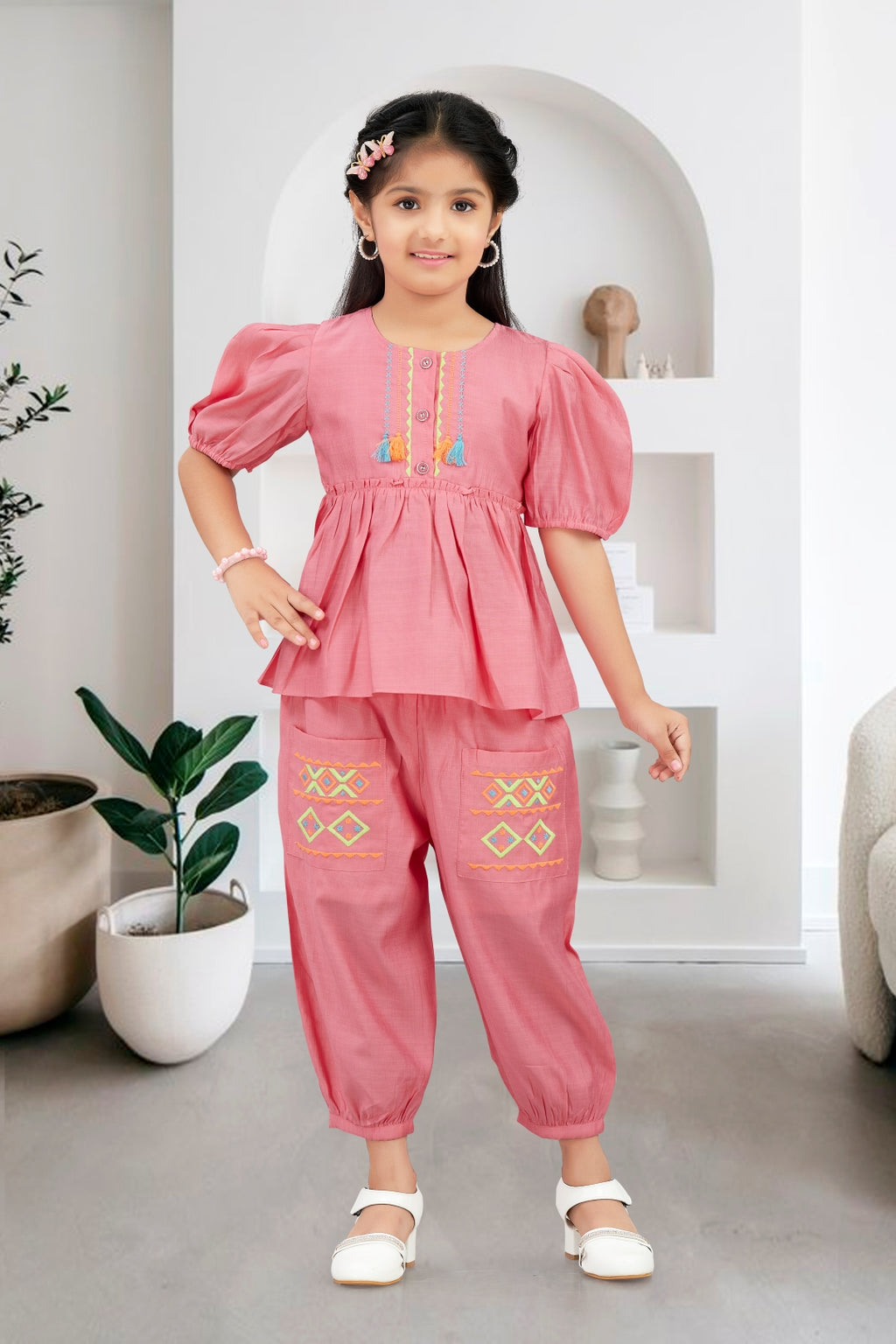 Girls Pink 2-Piece Peplum Set with Embroidered Design & Capri Pants