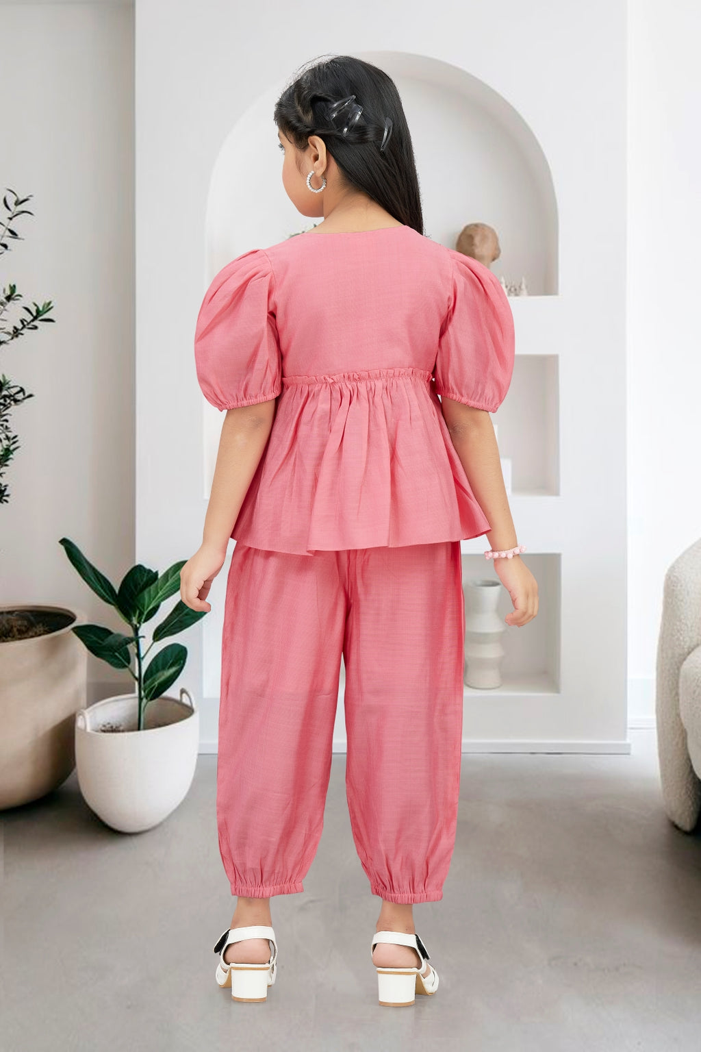 Girls Pink 2-Piece Peplum Set with Embroidered Design & Capri Pants