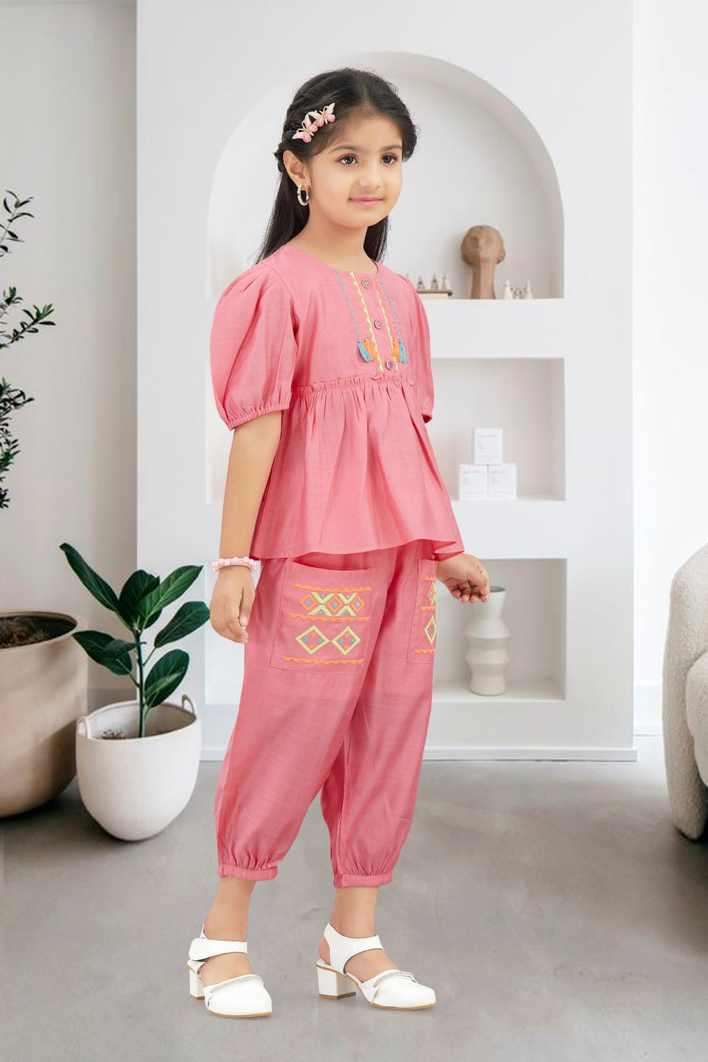 Girls Pink 2-Piece Peplum Set with Embroidered Design & Capri Pants