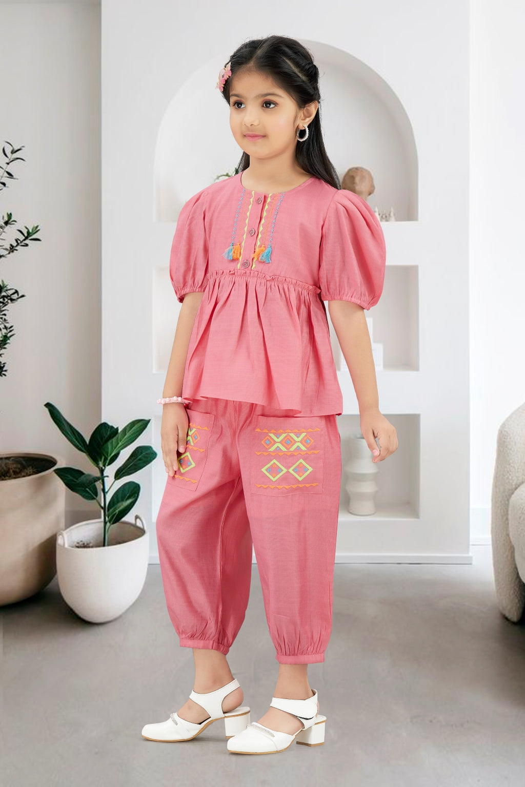 Girls Pink 2-Piece Peplum Set with Embroidered Design & Capri Pants