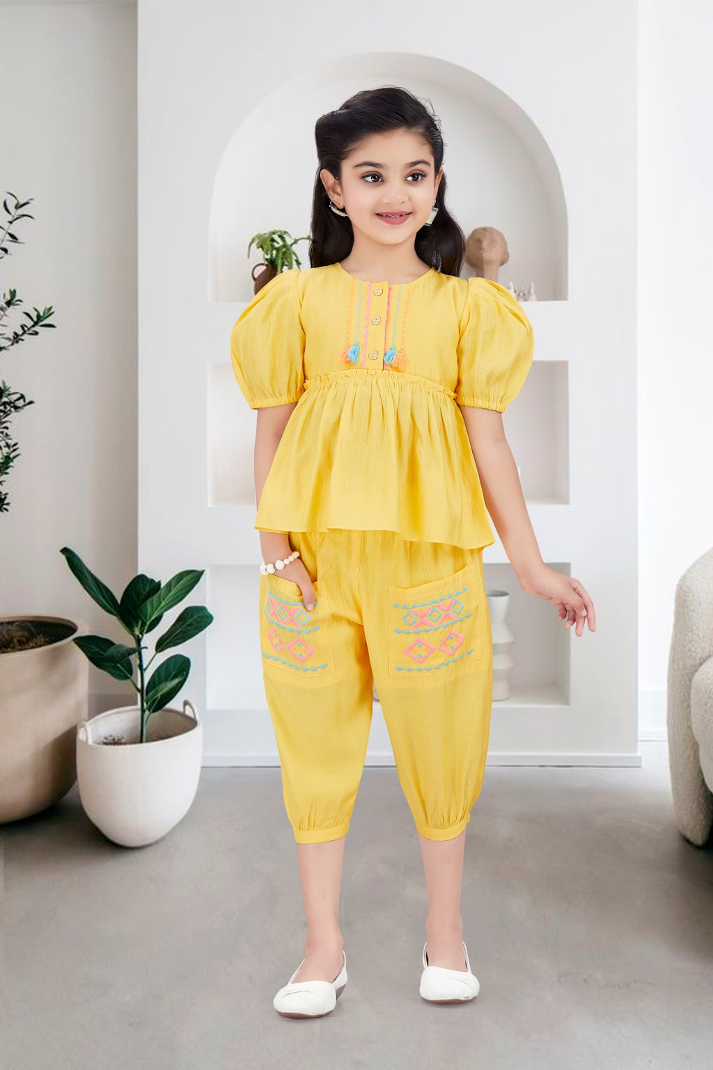 Girls 2-Piece Peplum Set with Embroidered Design & Capri Pants