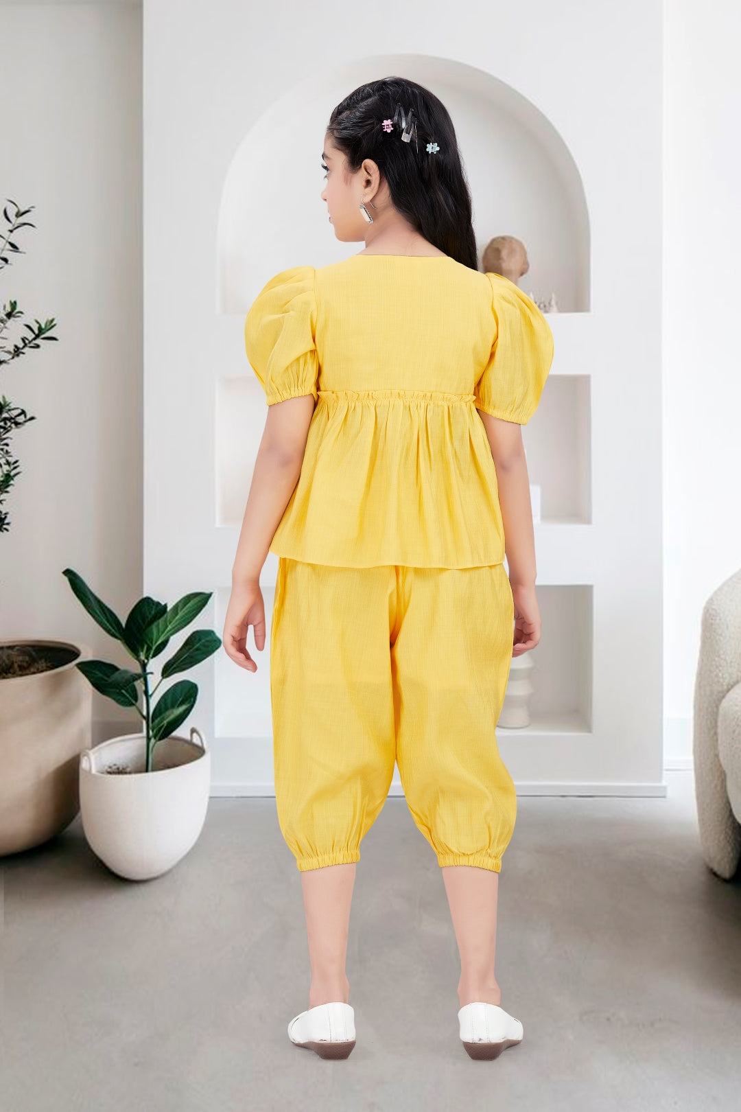 Girls 2-Piece Peplum Set with Embroidered Design & Capri Pants