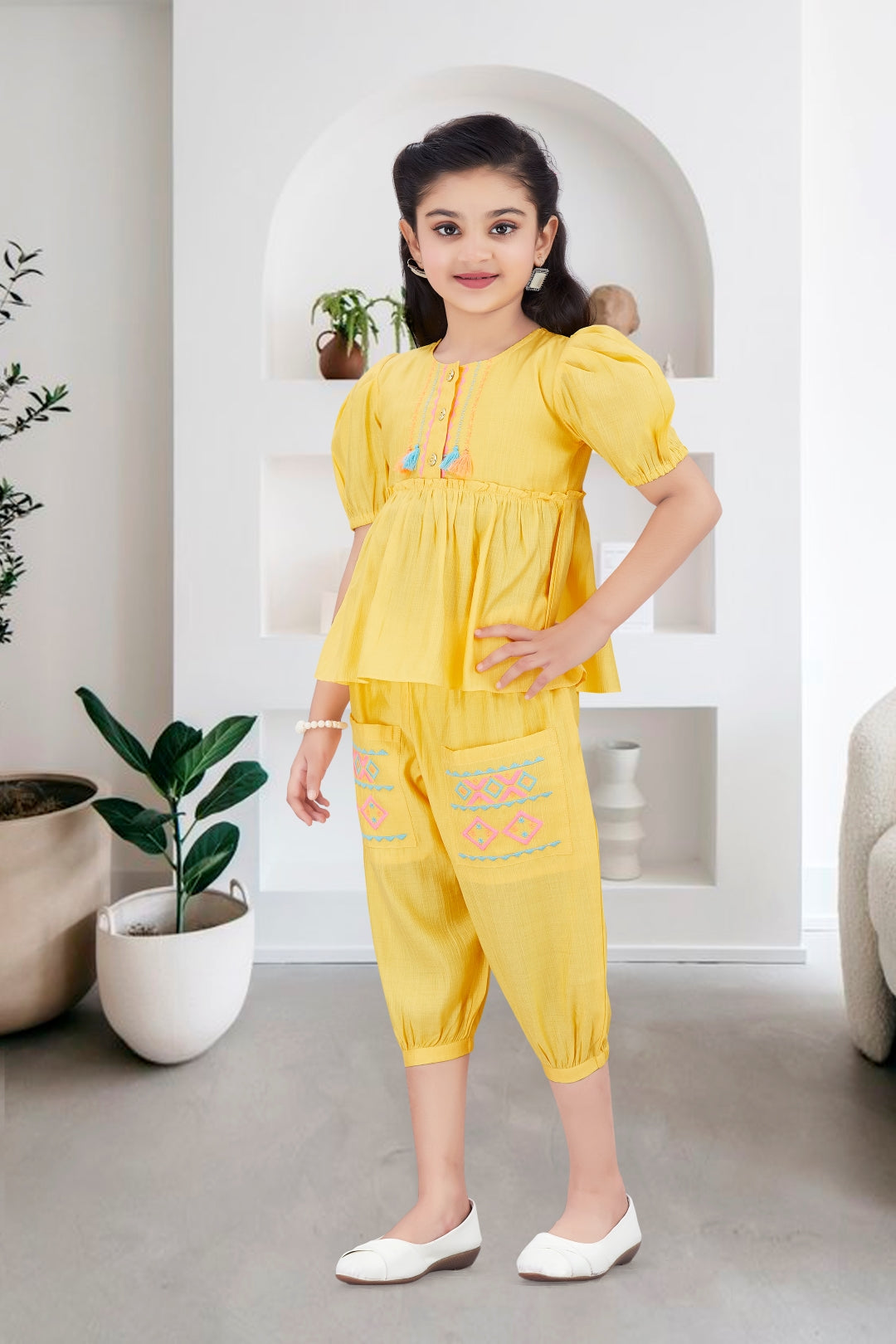 Girls 2-Piece Peplum Set with Embroidered Design & Capri Pants