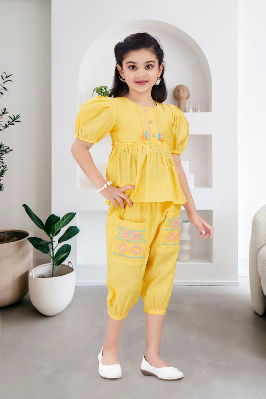 Girls 2-Piece Peplum Set with Embroidered Design & Capri Pants