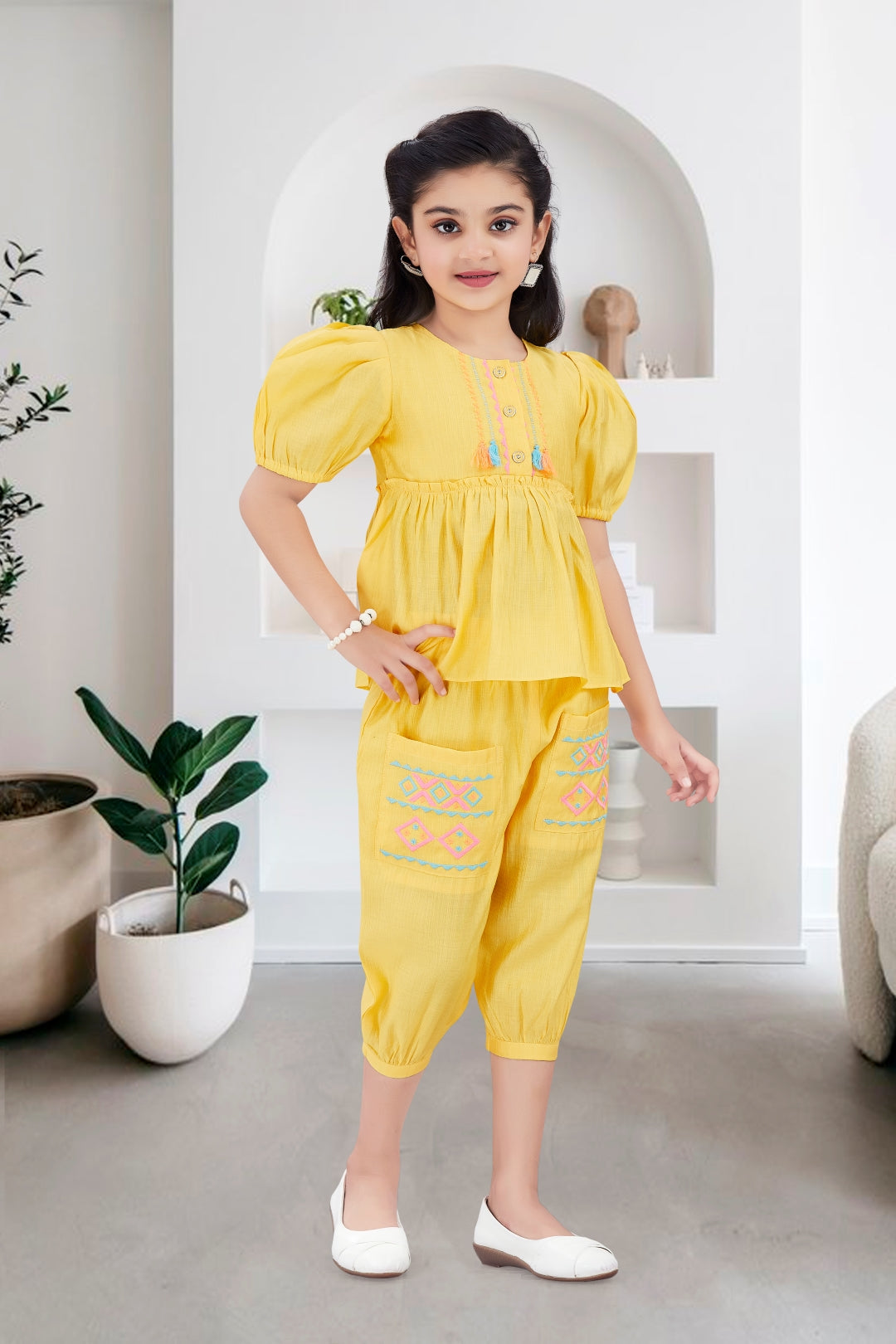 Girls 2-Piece Peplum Set with Embroidered Design & Capri Pants